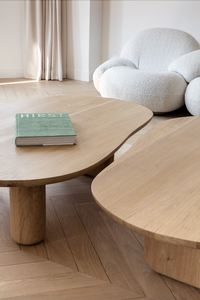 Table basse design de créateur ovale en bois de chêne clair massif